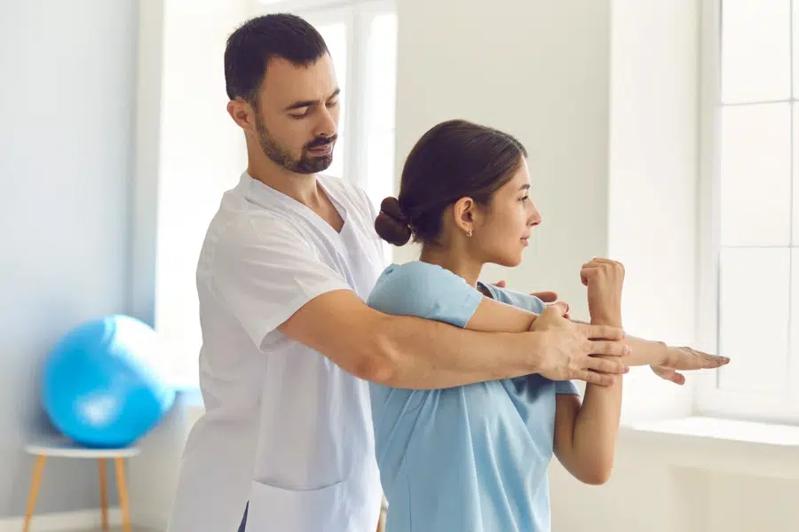 Shoulder stiffness being evaluated as a sign of whiplash in Yorktown VA